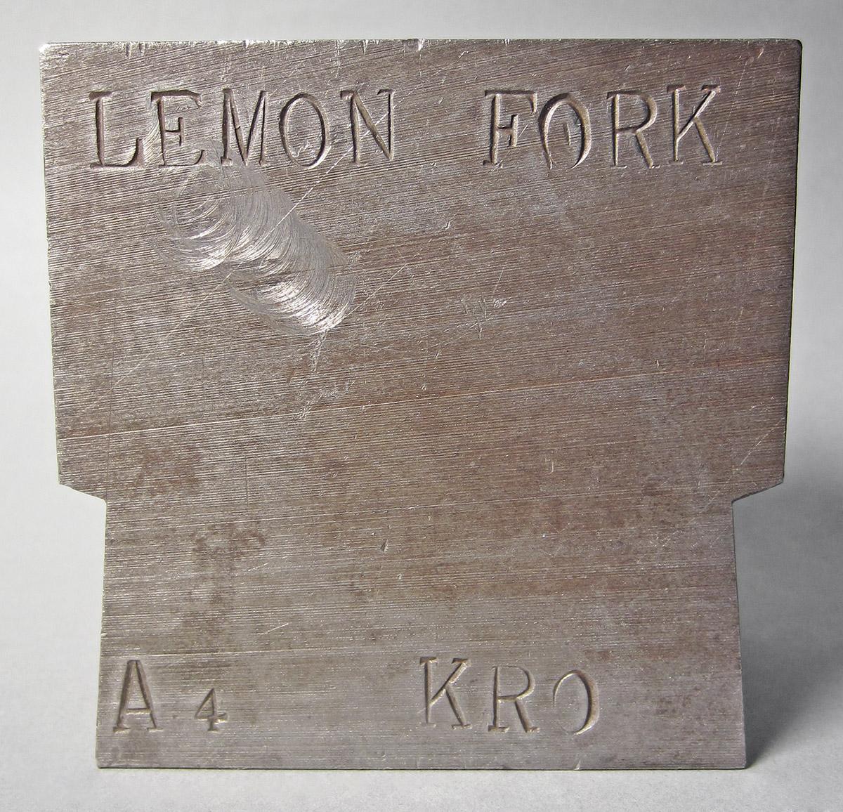 1986.0050.165, Die, mark