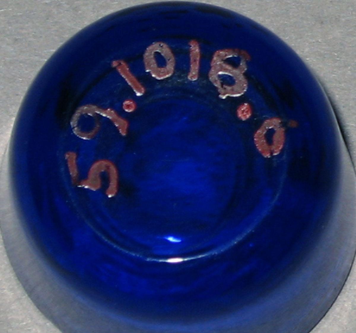 1959.1018.006 Miniature glass tumbler (underside)