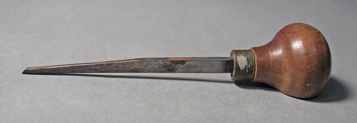 1986.0050.164, Graver, side 2