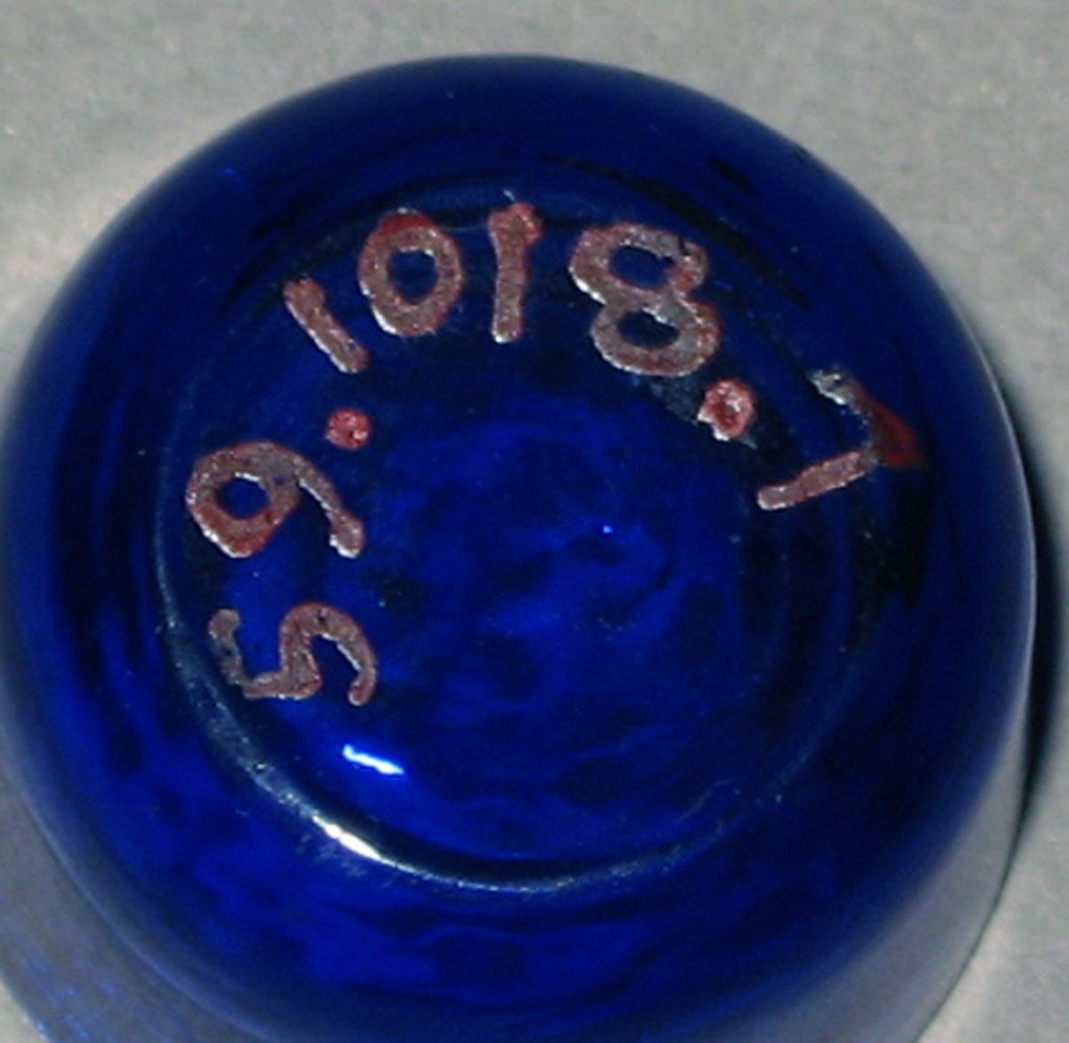 1959.1018.007 Miniature glass tumbler (underside)