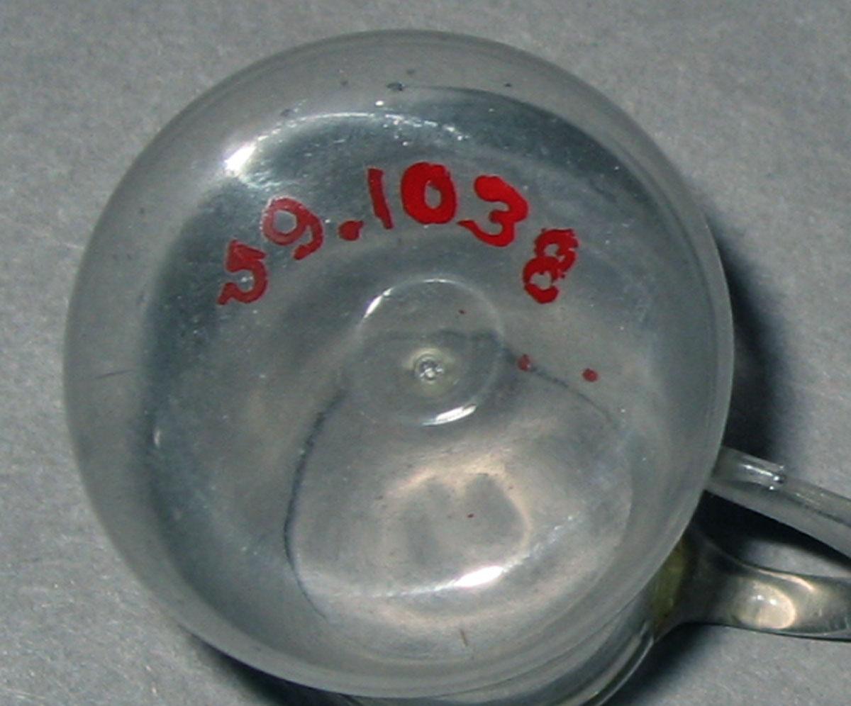 1959.1038 Miniature glass jug (underside)