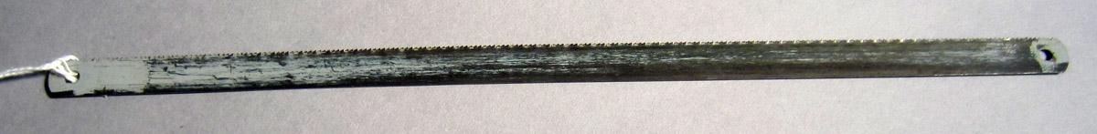 1986.0050.421 B Saw, View 1