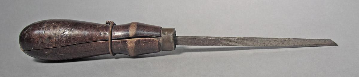 1986.0050.448, Lathe tool, side 1