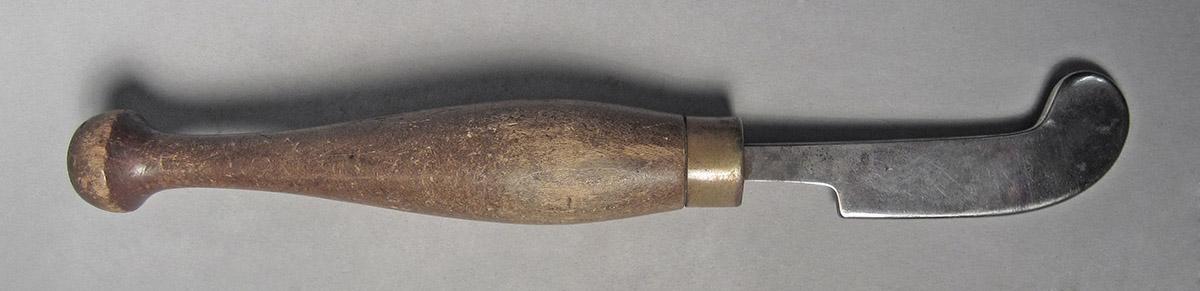 1986.0050.458, Burnisher, side 1