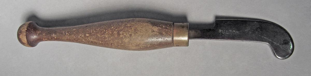 1986.0050.458, Burnisher, side 2