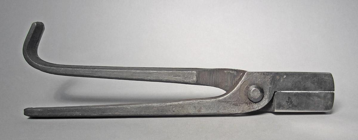 1986.0050.462, Pincers, side 1