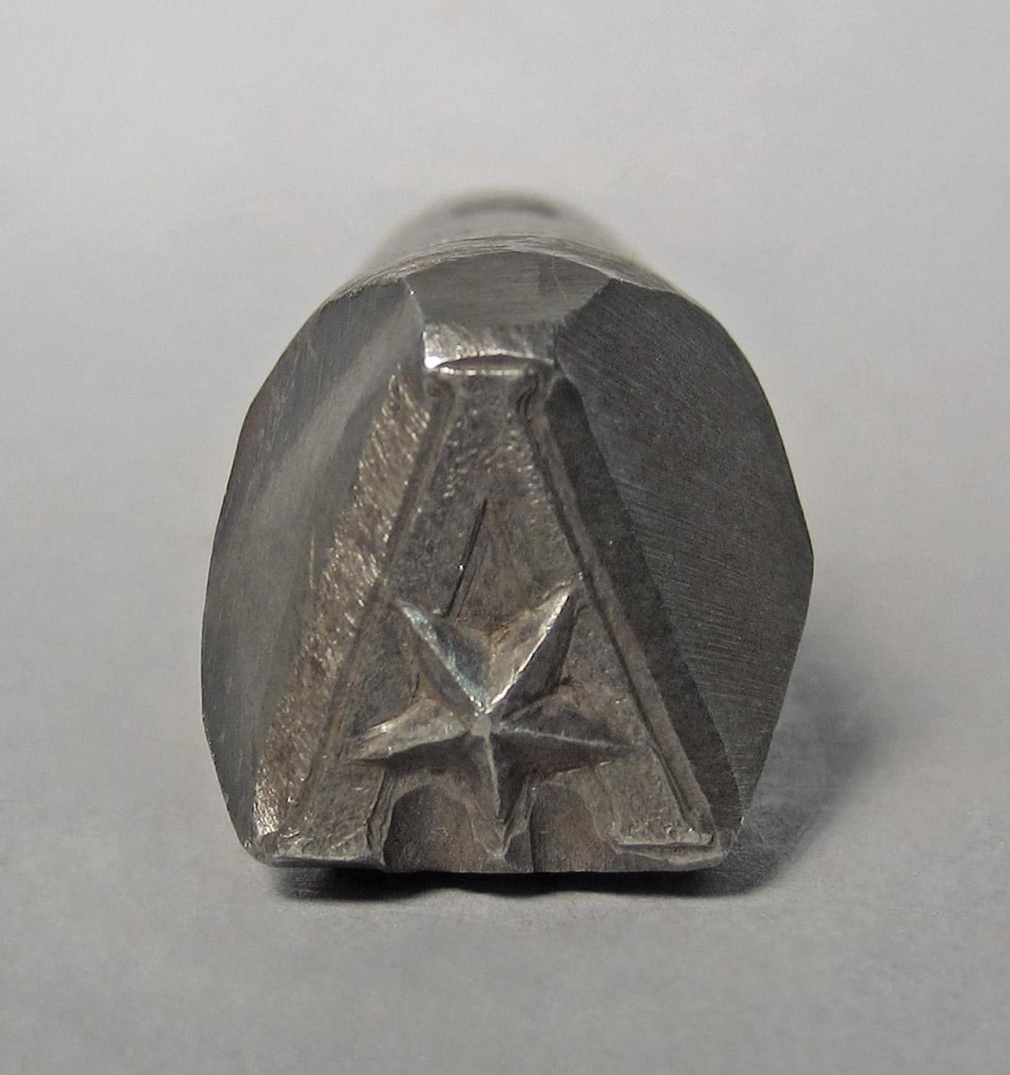 1986.0050.506, Stamp, tip