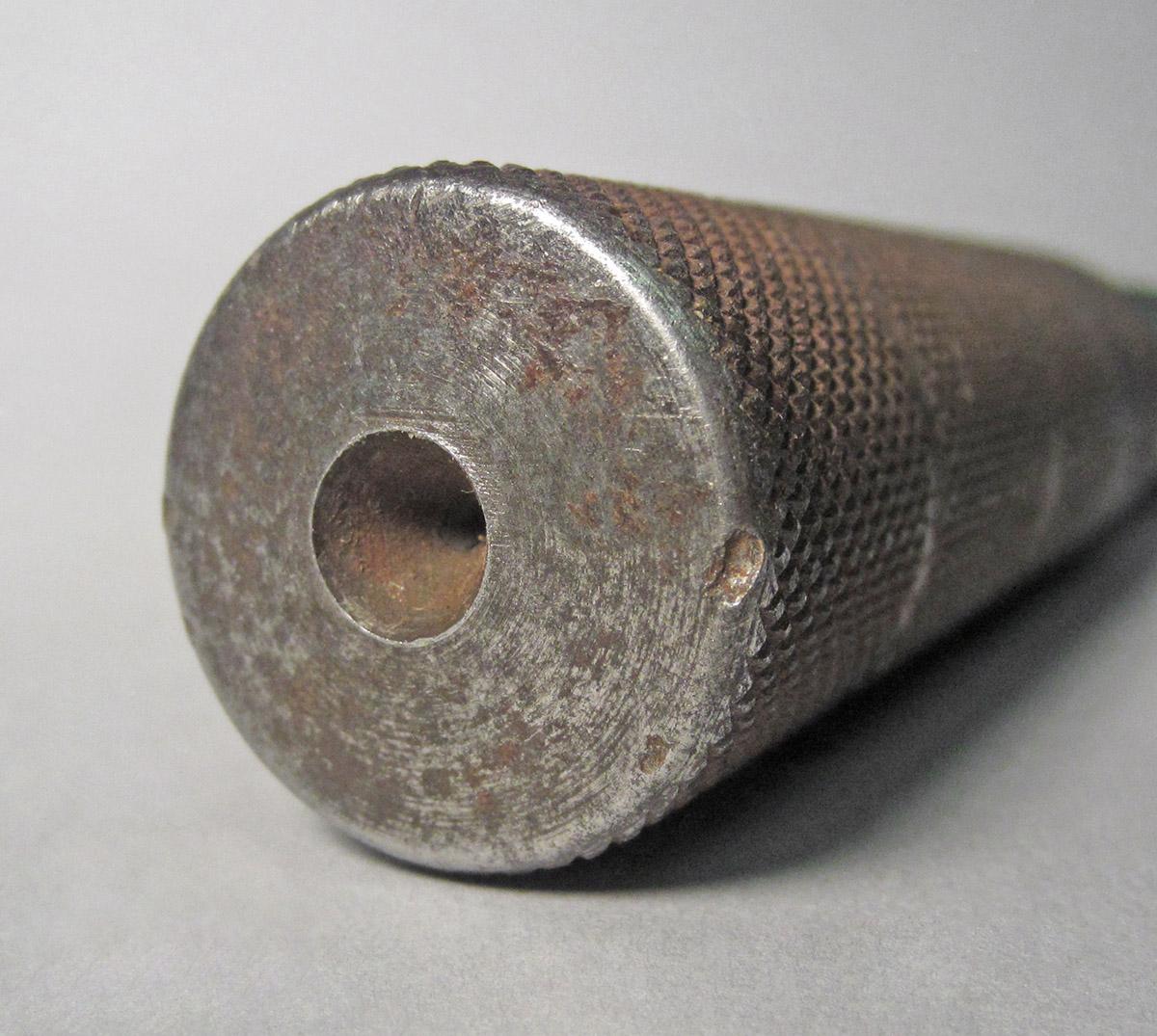 1986.0050.532, Mandrel, end detail