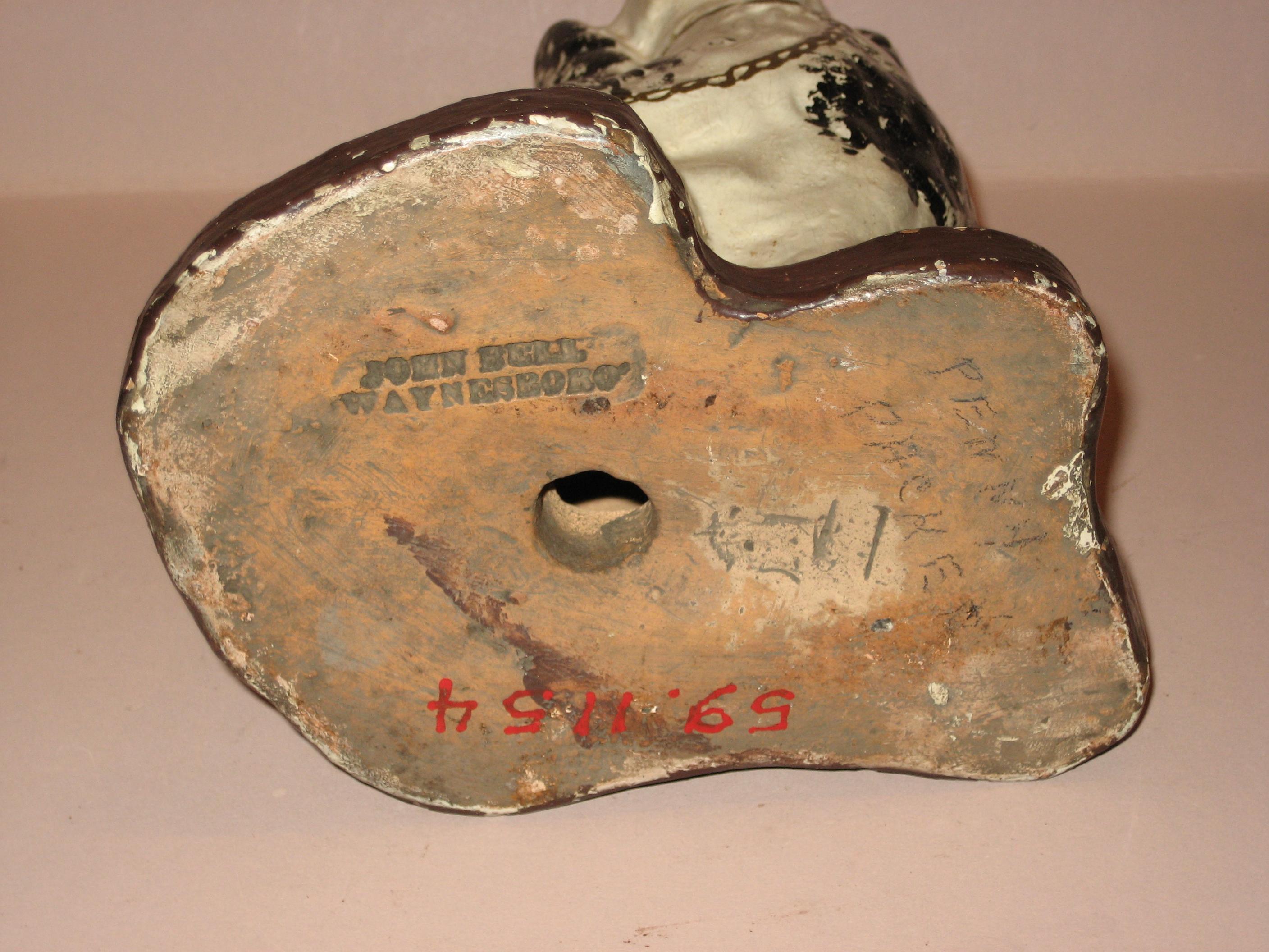 1959.1154 Dog figure (underside)