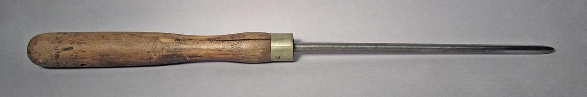 1986.0050.781, Spinning tool, side 1
