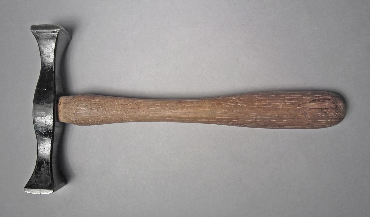 1986.0050.804.020, Hammer, side 1