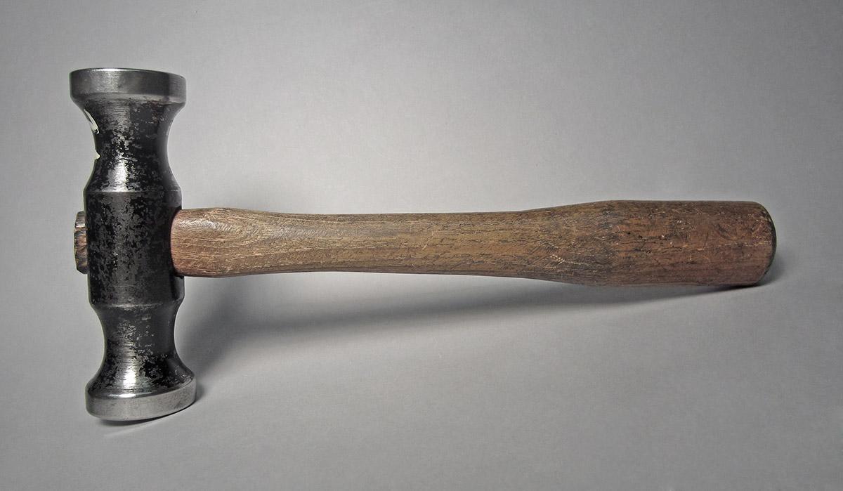 1986.0050.813.001.032, Hammer, side 1