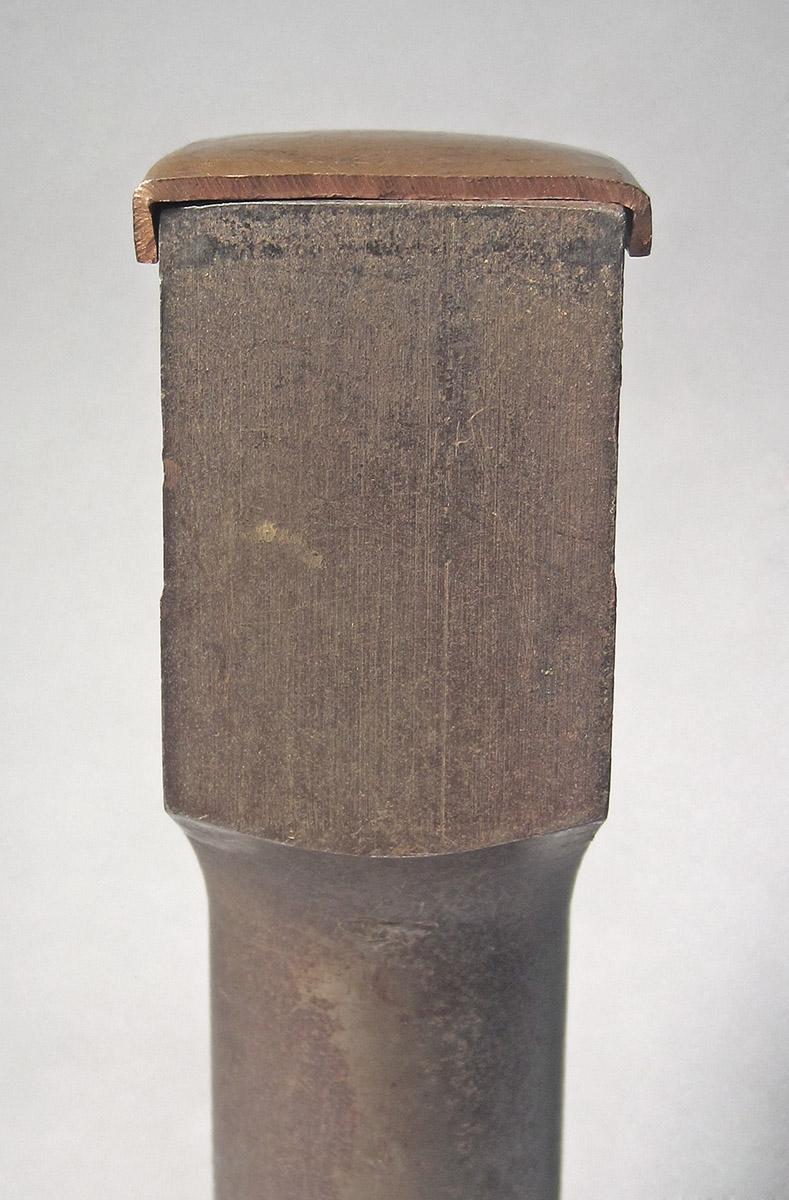1986.0050.666 A, B, Stake, head with cap side 1