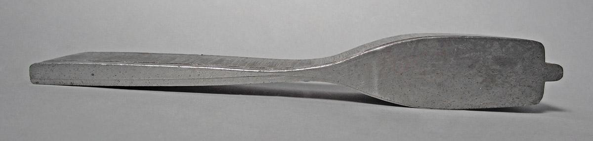 1986.0050.696, Tool, side 2
