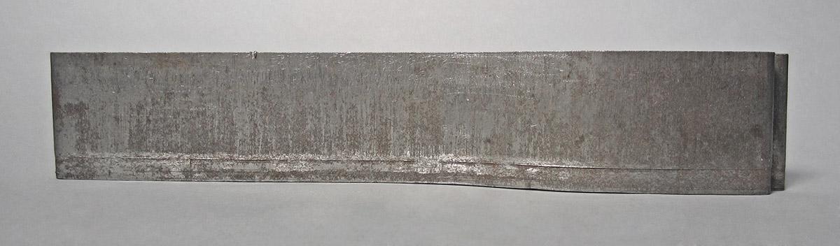 1986.0050.696, Tool, side 3