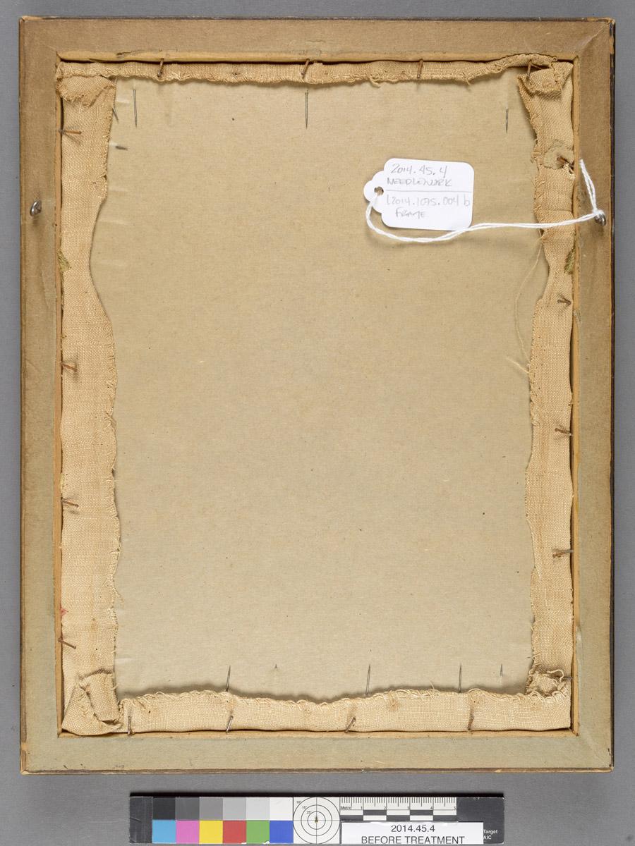 2014.0045.004 Needlework, reverse, before conservation treatment