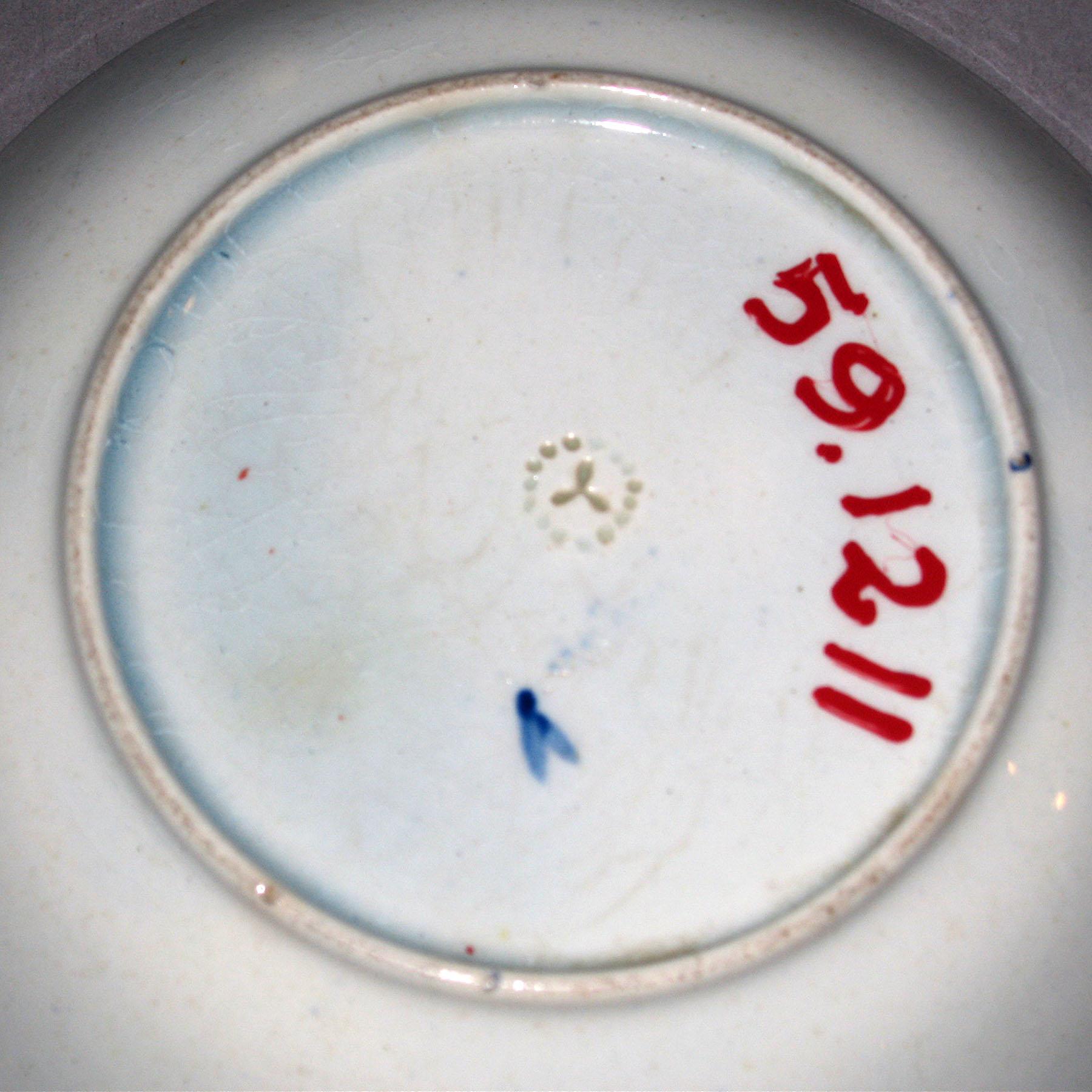 1959.1211 Pearlware saucer (mark)