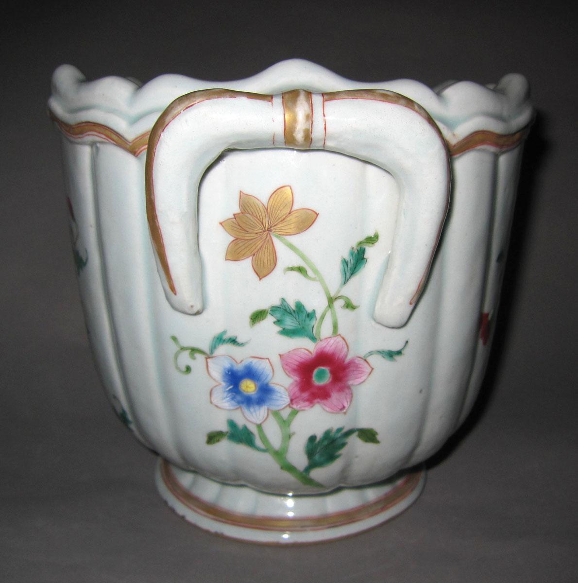 1959.1347 Porcelain flower container face two