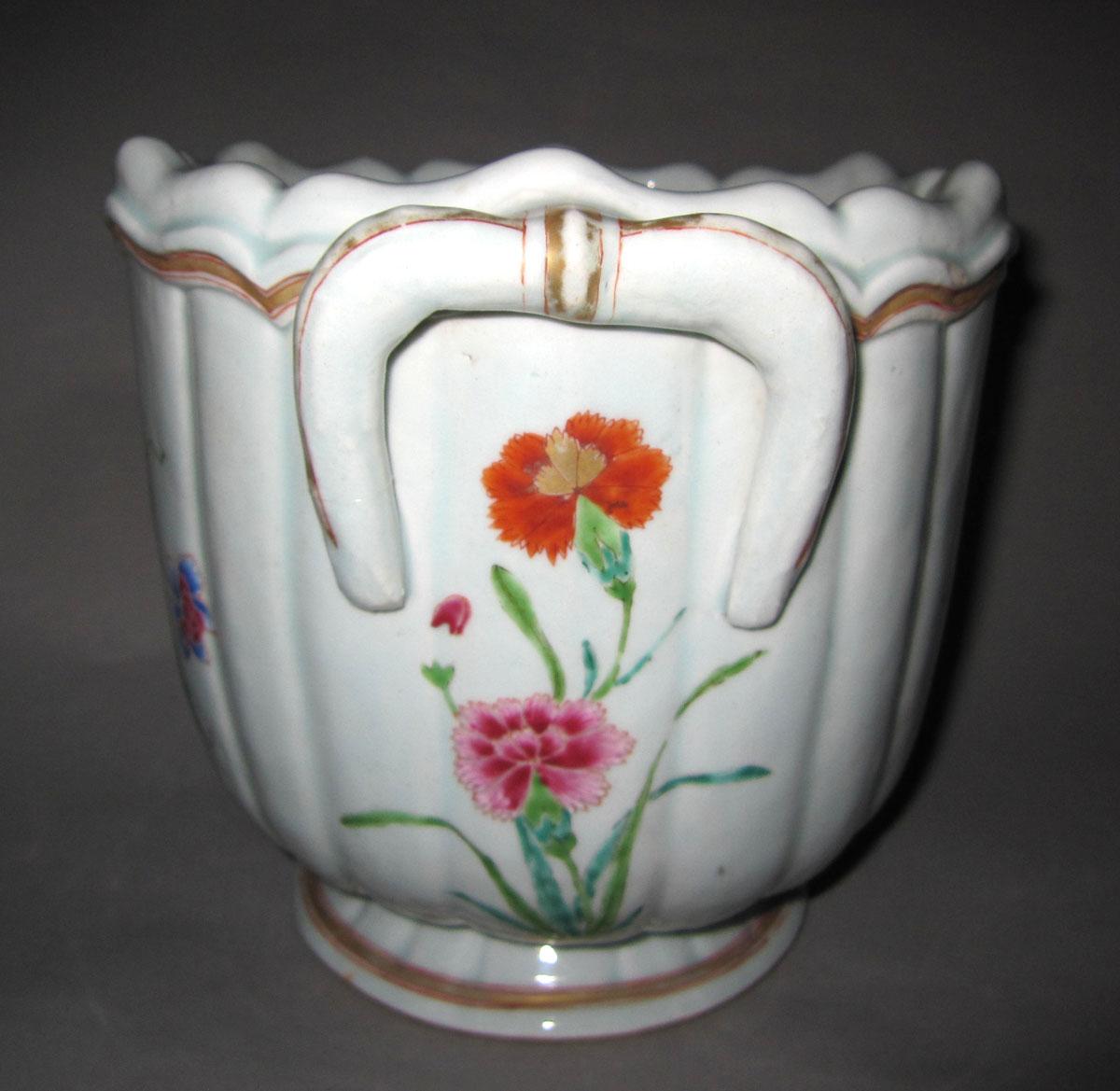 1959.1347 Porcelain flower container face four