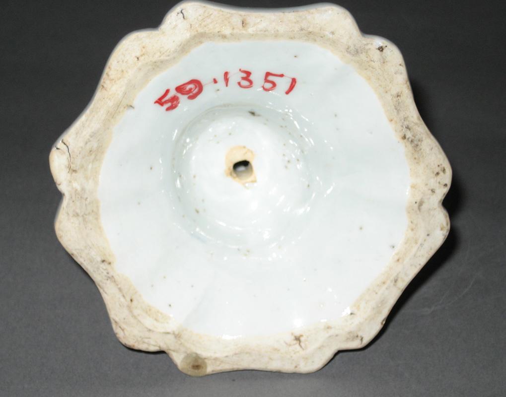 1959.1351 Candlestick underside