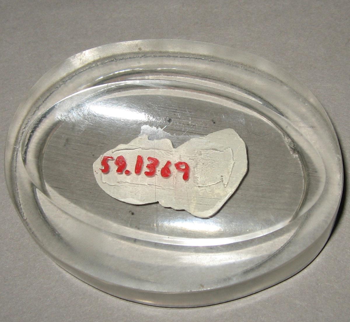 1959.1369 Glass plaque (underside)