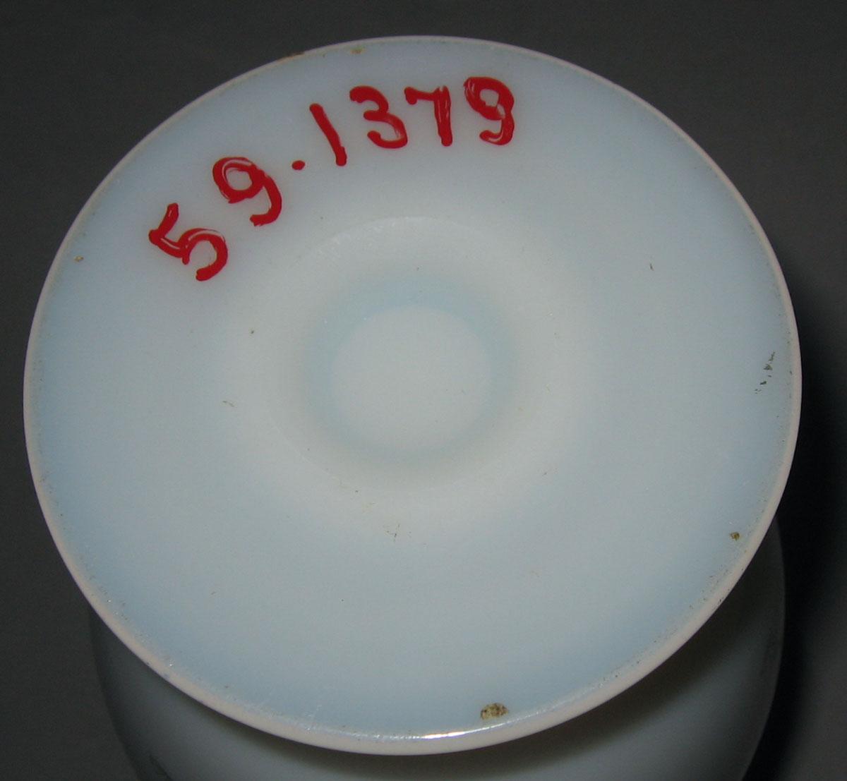 1959.1379 White glass vase (underside)