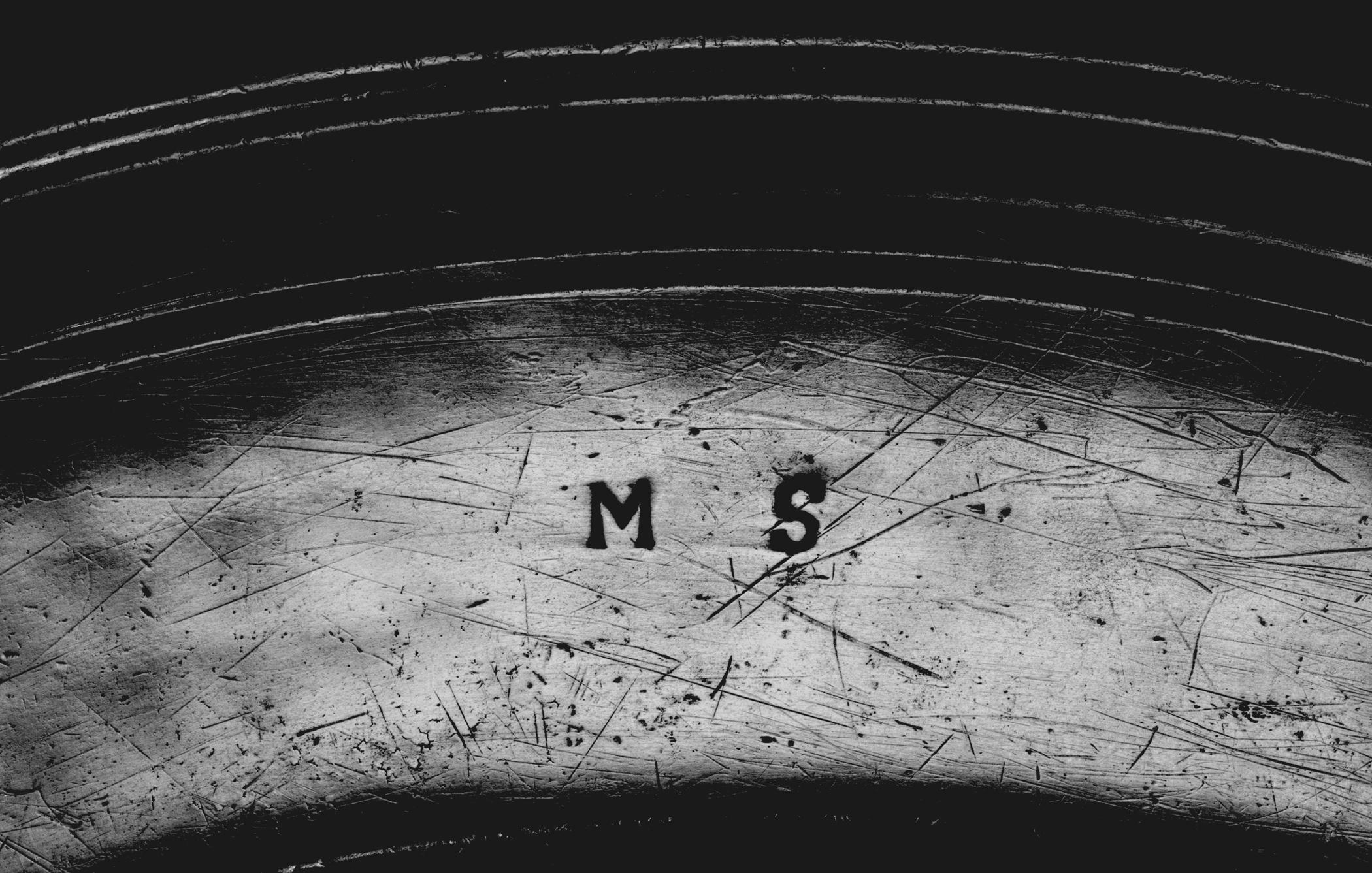 1953.0179 Pewter charger (marks)