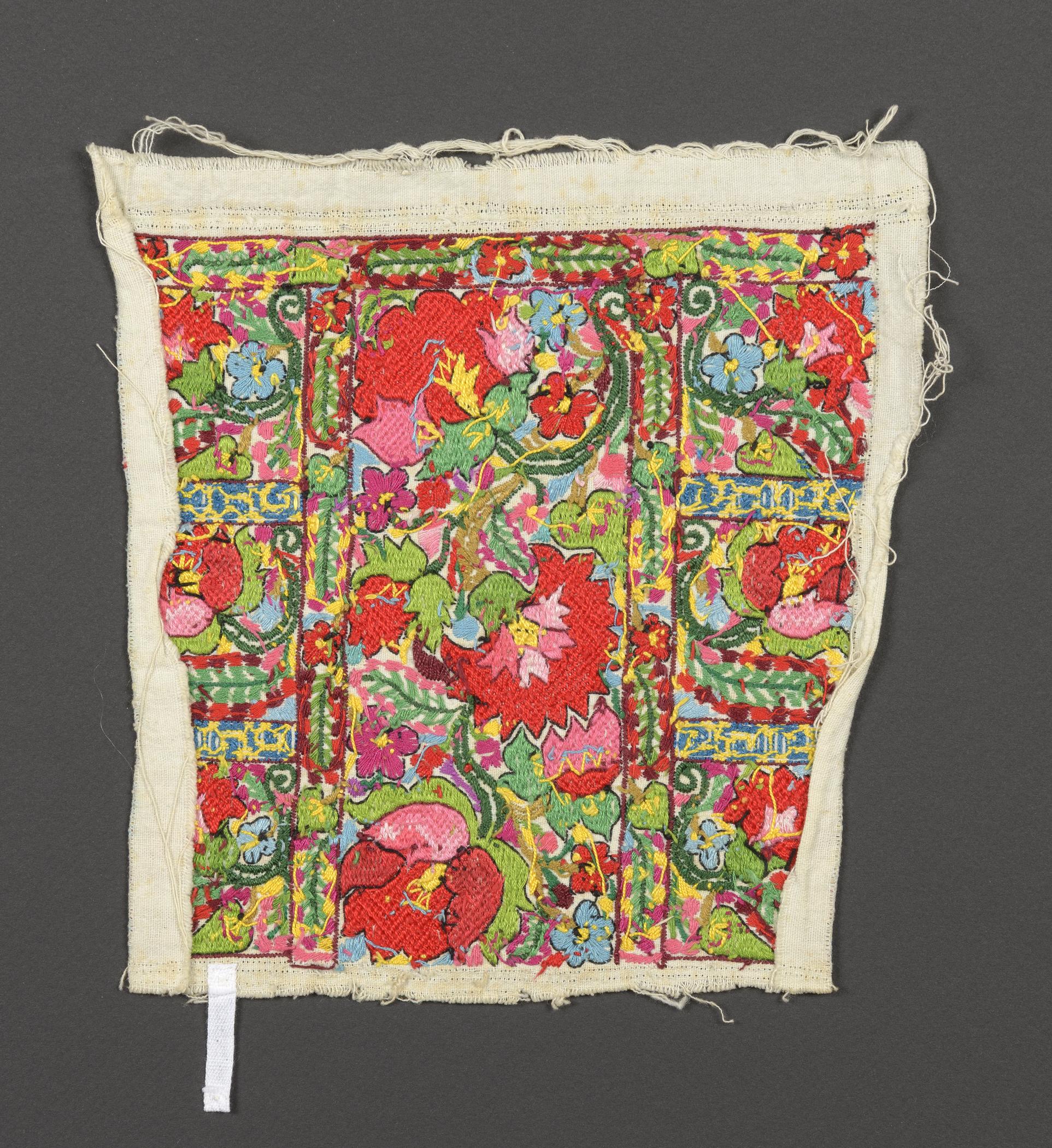 2015.0047.059 Textile fragment, embroidered, view 2, reverse