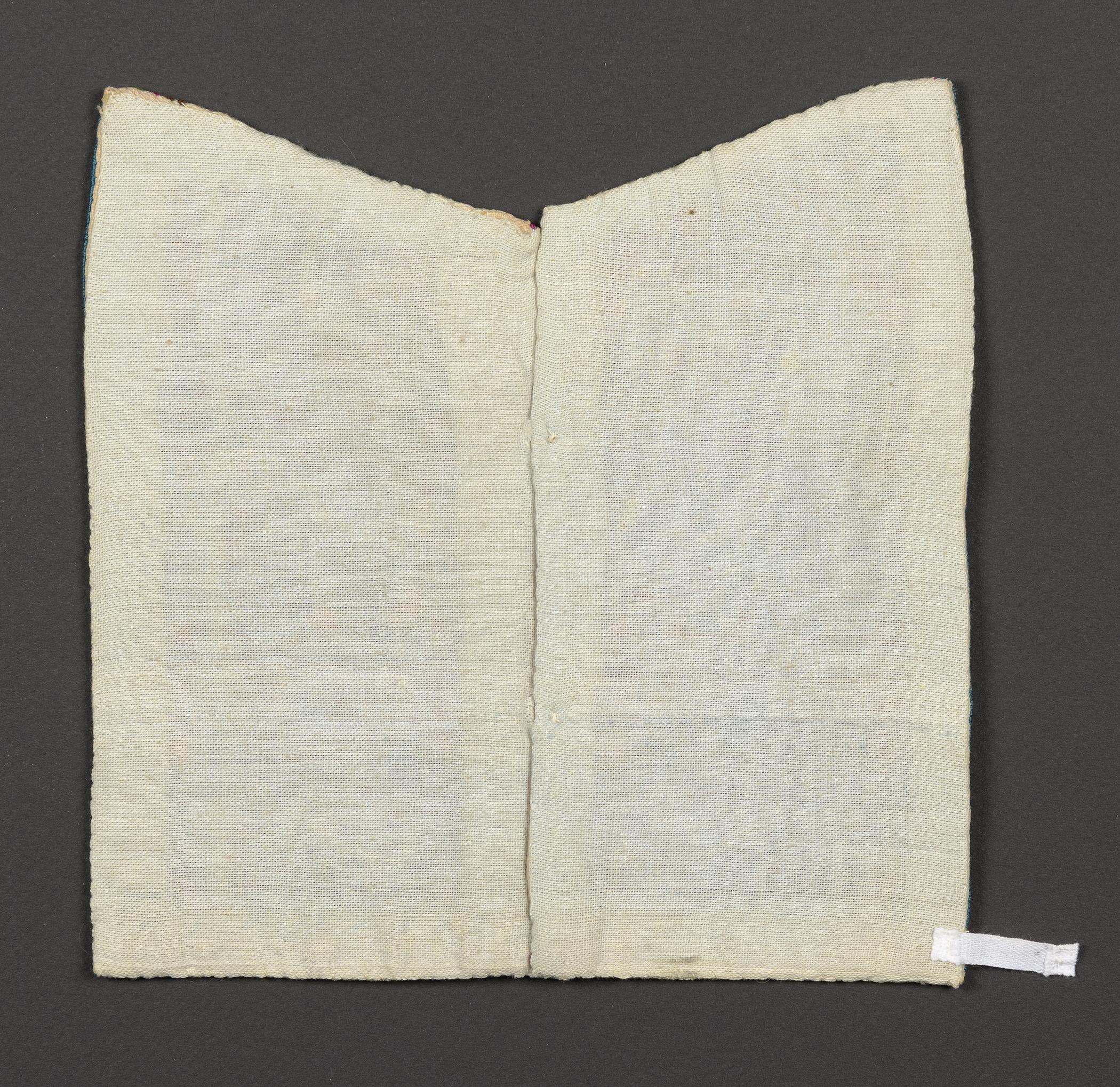 2015.0047.062 Textile fragment, embroidered, view 2, reverse