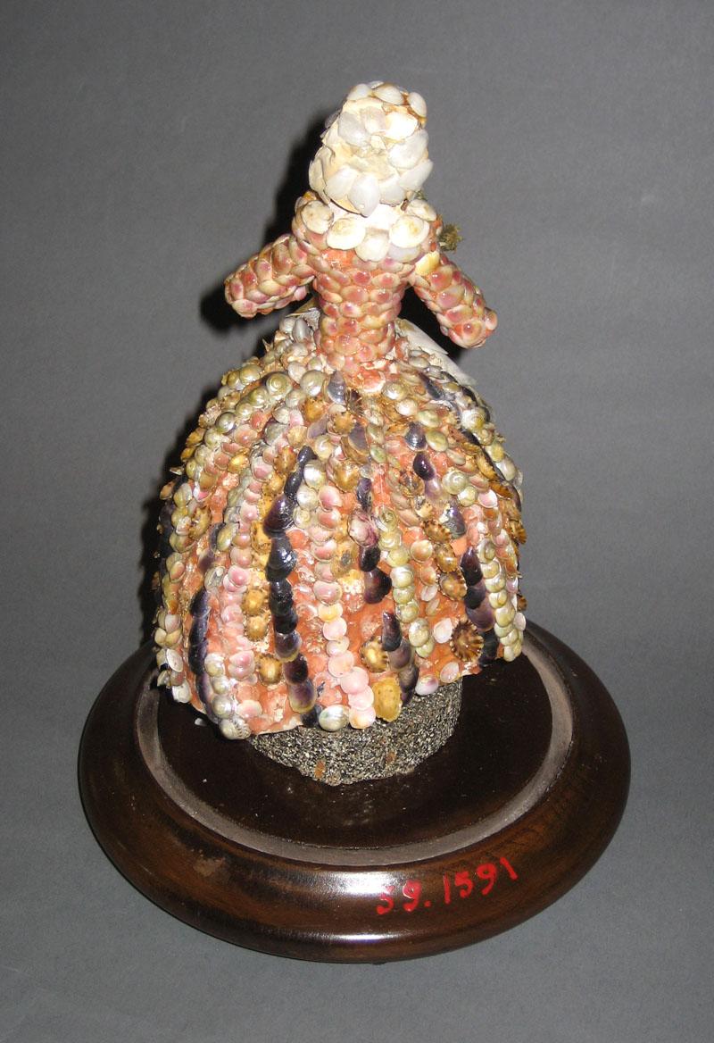 1959.1591 Figure of a woman rear