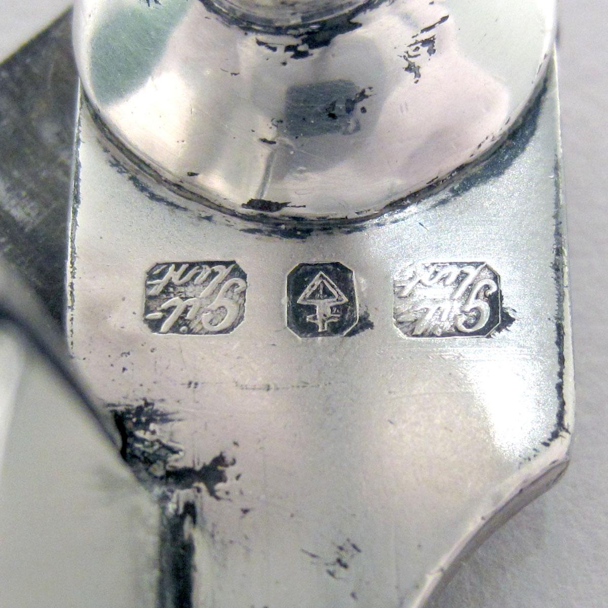 1959.1594 Snuffer mark