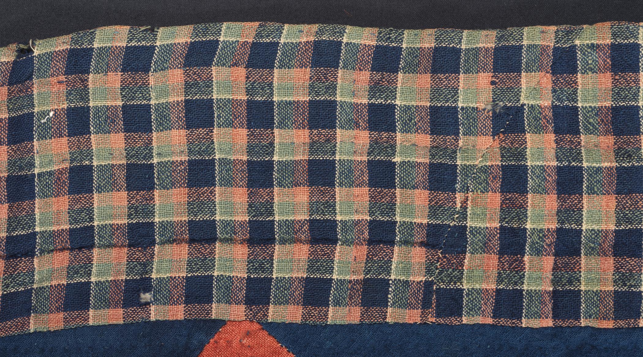 2016.0017 Quilt, detail 2, before conservation treatment