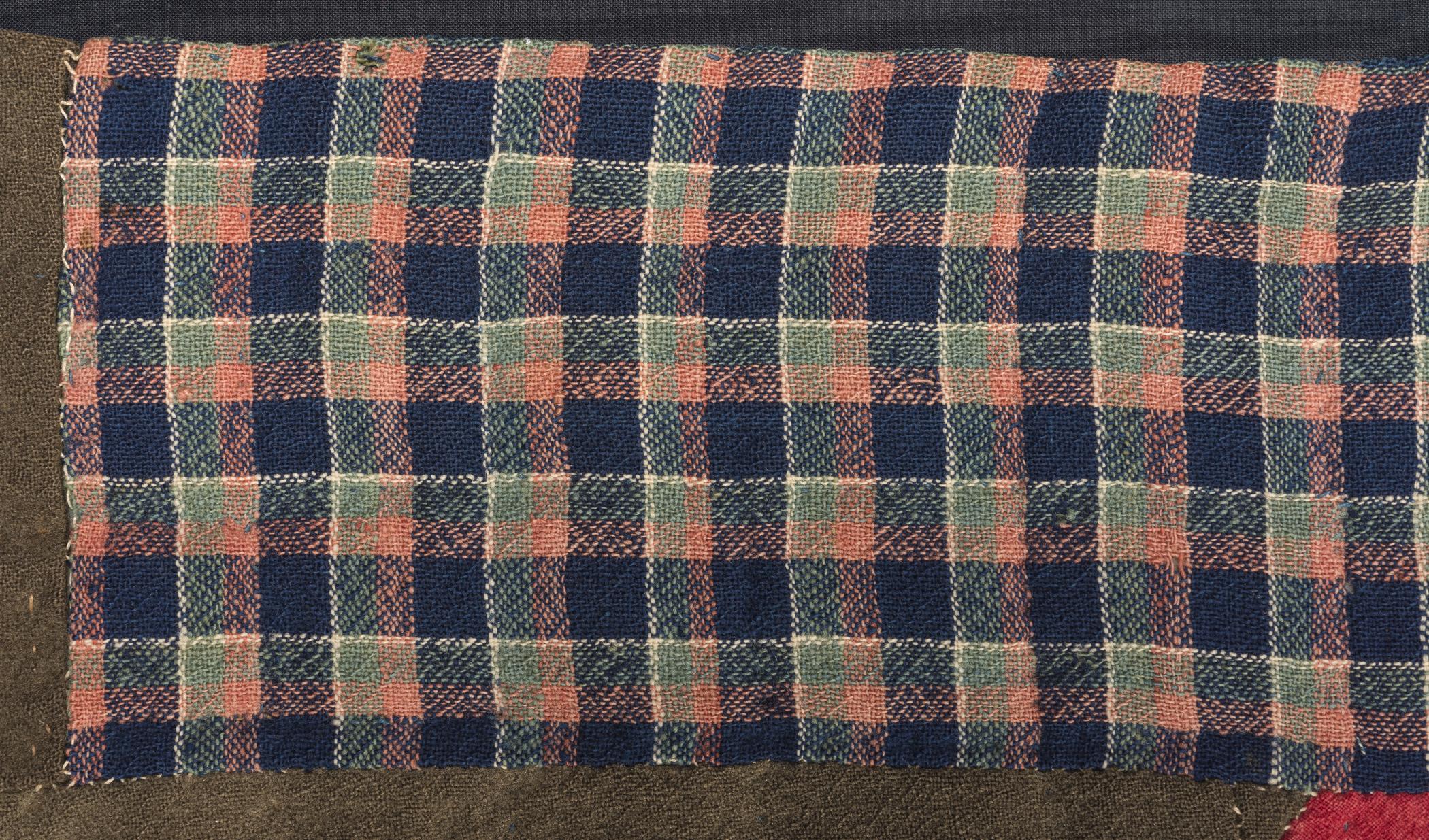 2016.0017 Quilt, detail 3, before conservation treatment