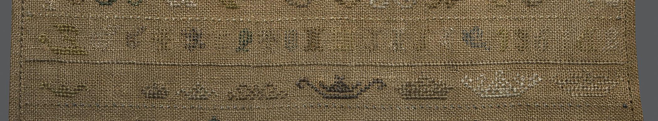 1969.9222 Sampler, reverse, detail 6