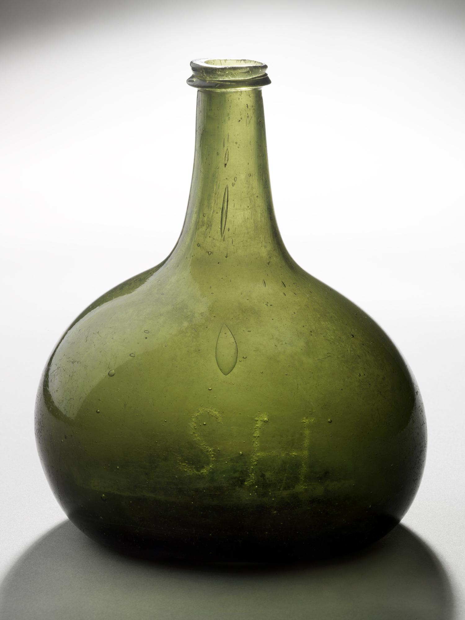 1959.1723 Bottle initialed "SH"