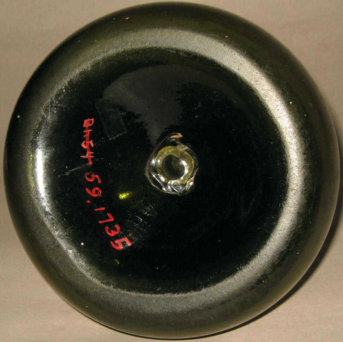 1959.1735 Glass onion bottle (underside)