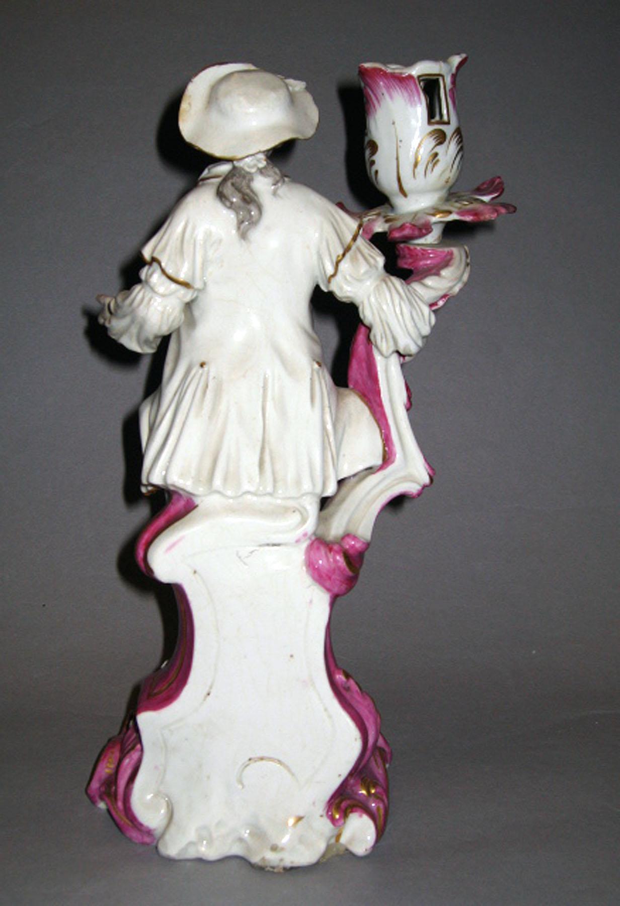 1959.1885.001 Porcelain candlestick figure (reverse)