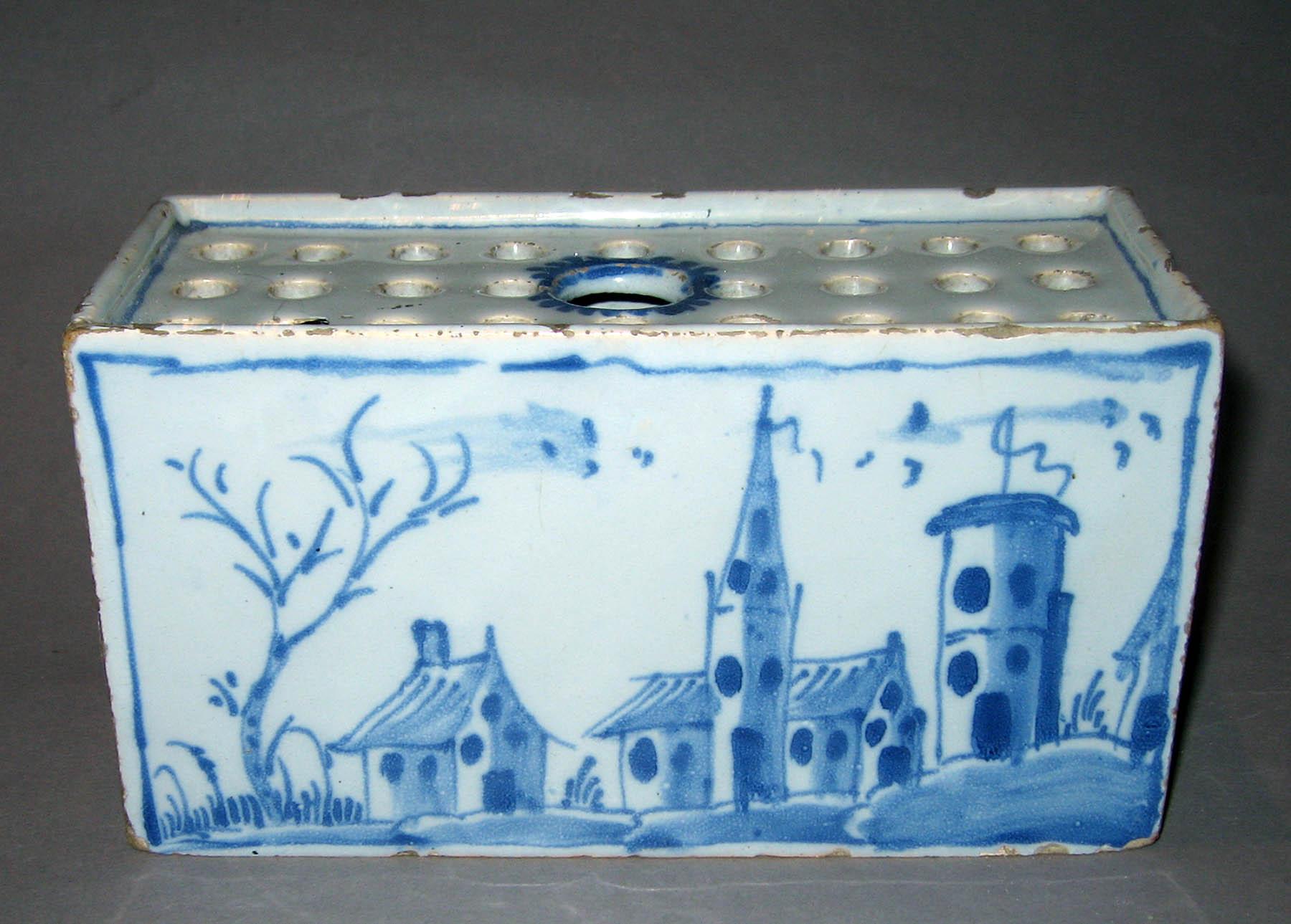 1959.1895 Earthenware flower brick