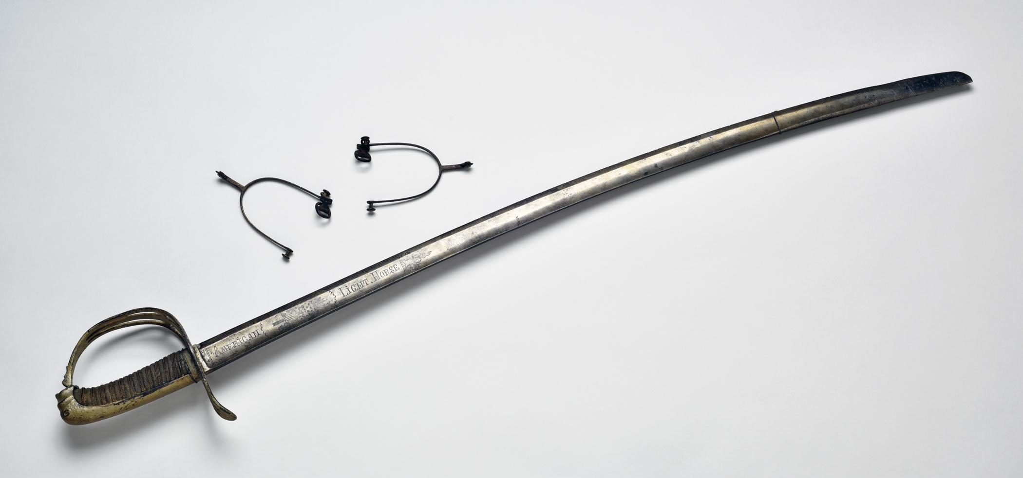 2019.0014.006 A Sword, B, C Spurs, view 1