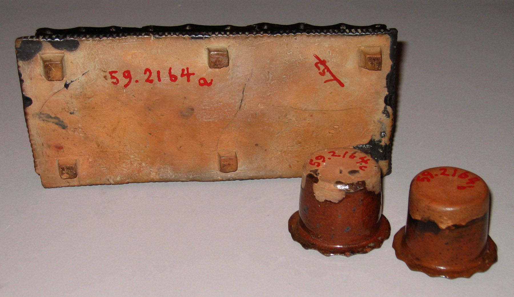 1959.2164 A-C Redware inkwell (bottom)