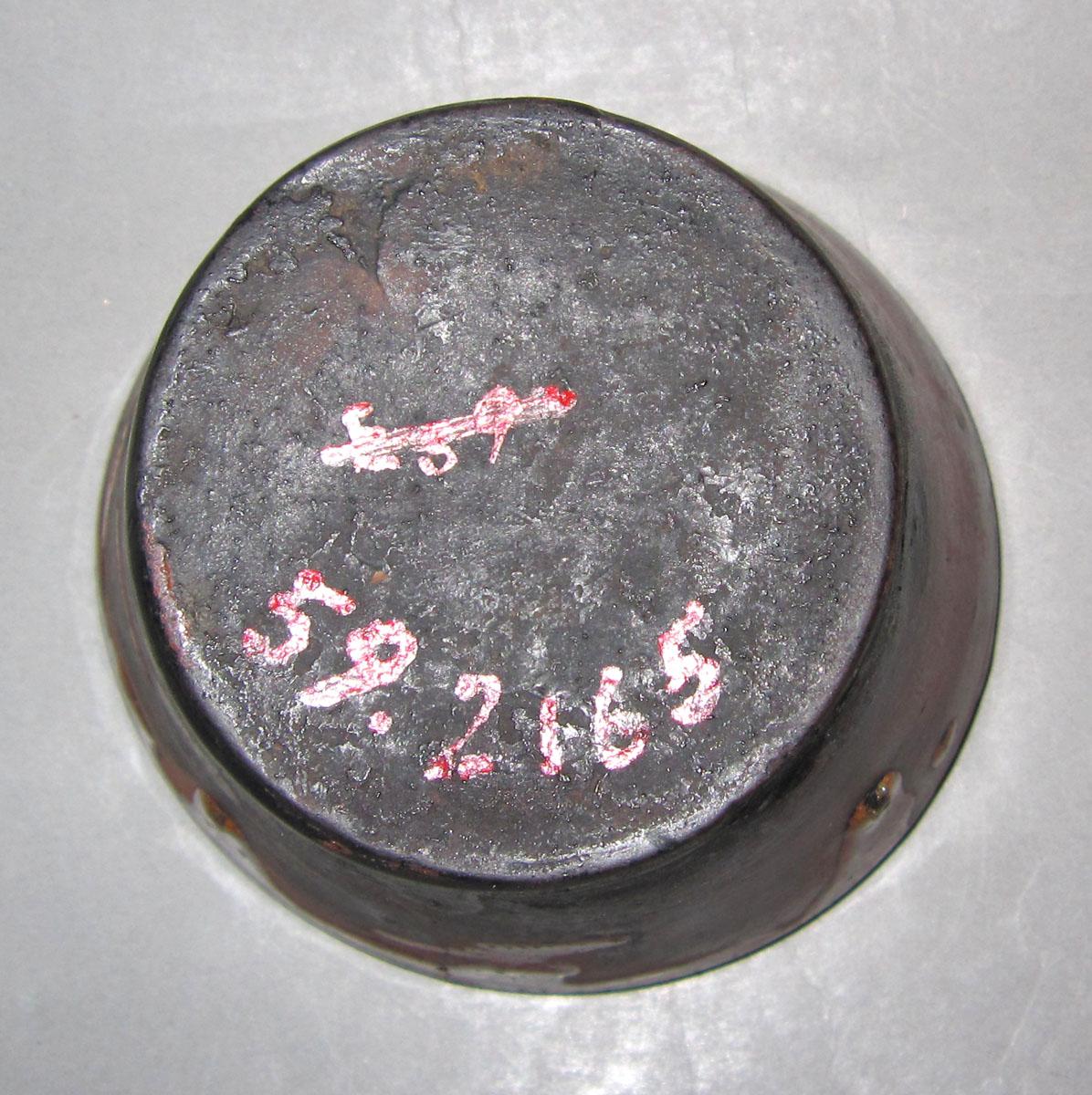 1959.2165 Redware bowl underside