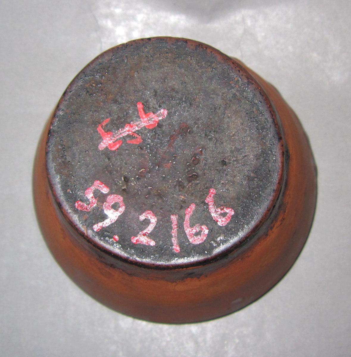 1959.2166 Redware bowl underside