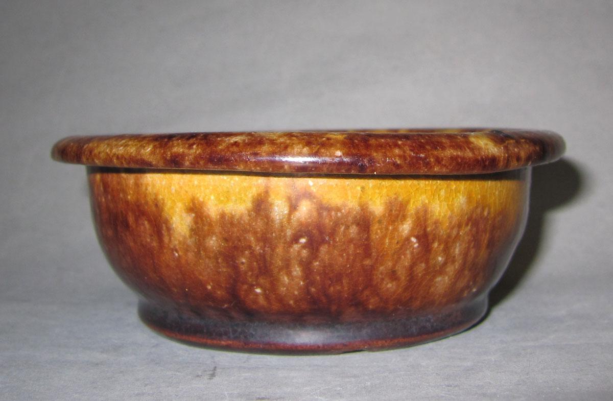 1959.2167 Buff-colored earthenware bowl