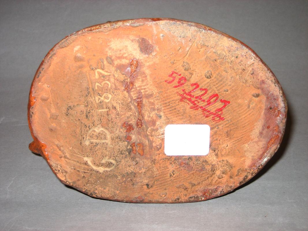 1959.2207 Figure (cow and pig), underside