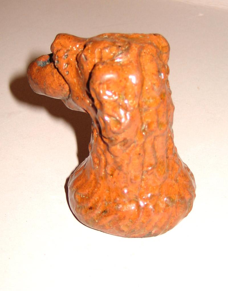 1959.2213 Figure (dog head) side view.