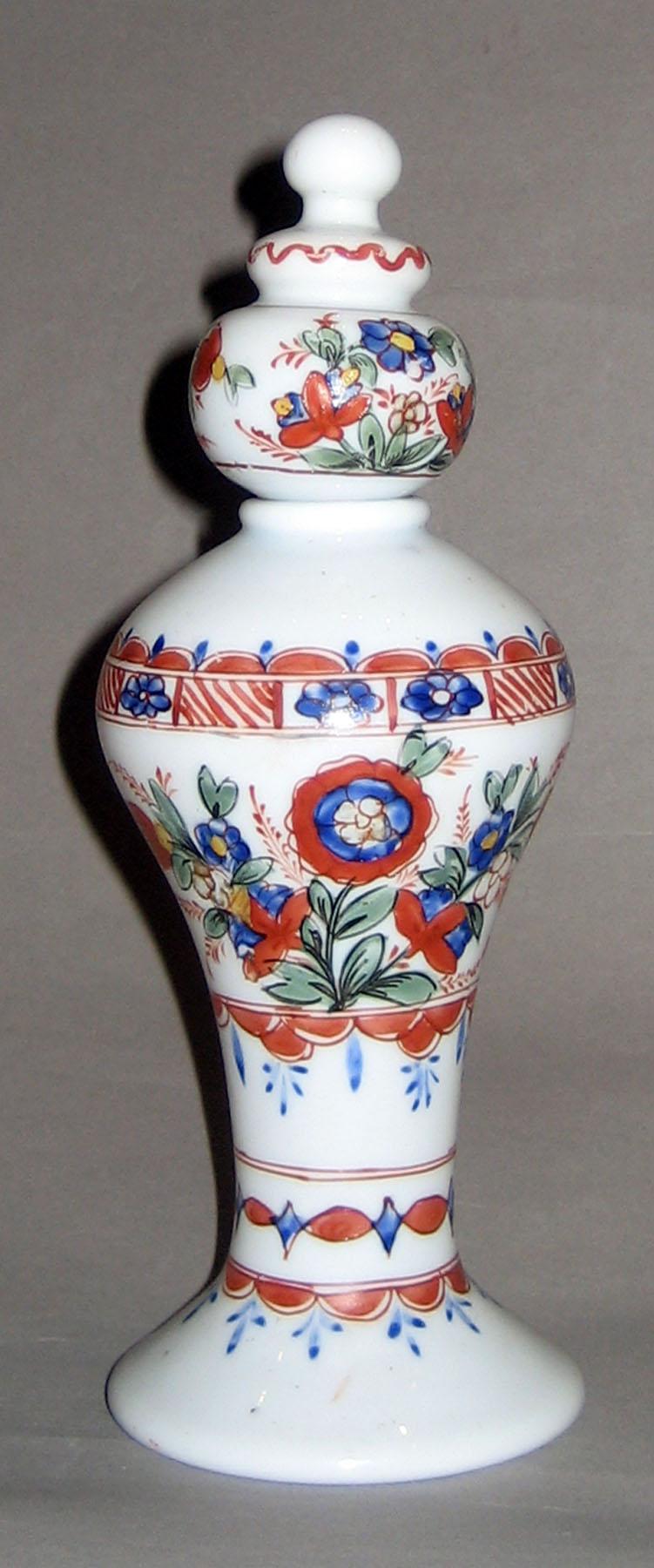 1952.0001 A, B White Glass Bottle