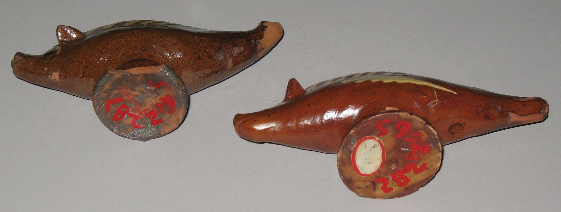 1959.2287, 1959.2282 Slipware whistles (bottom)