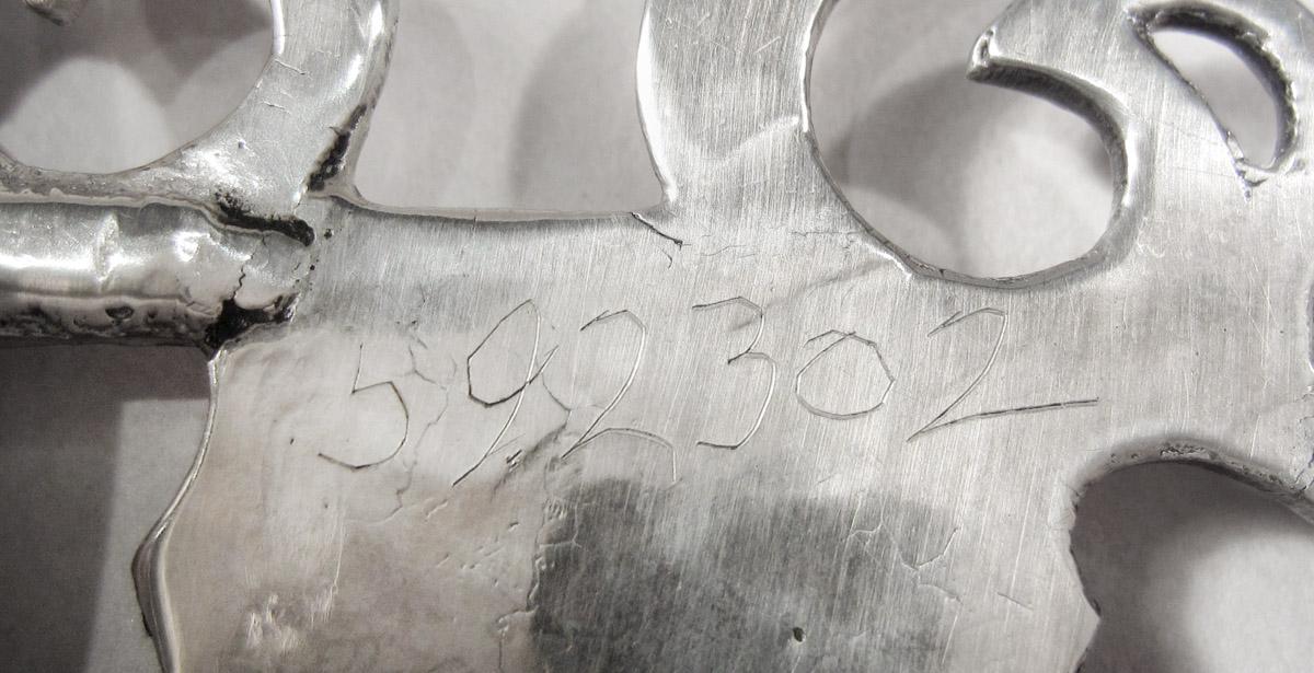 1959.2302 Porringer, inscription