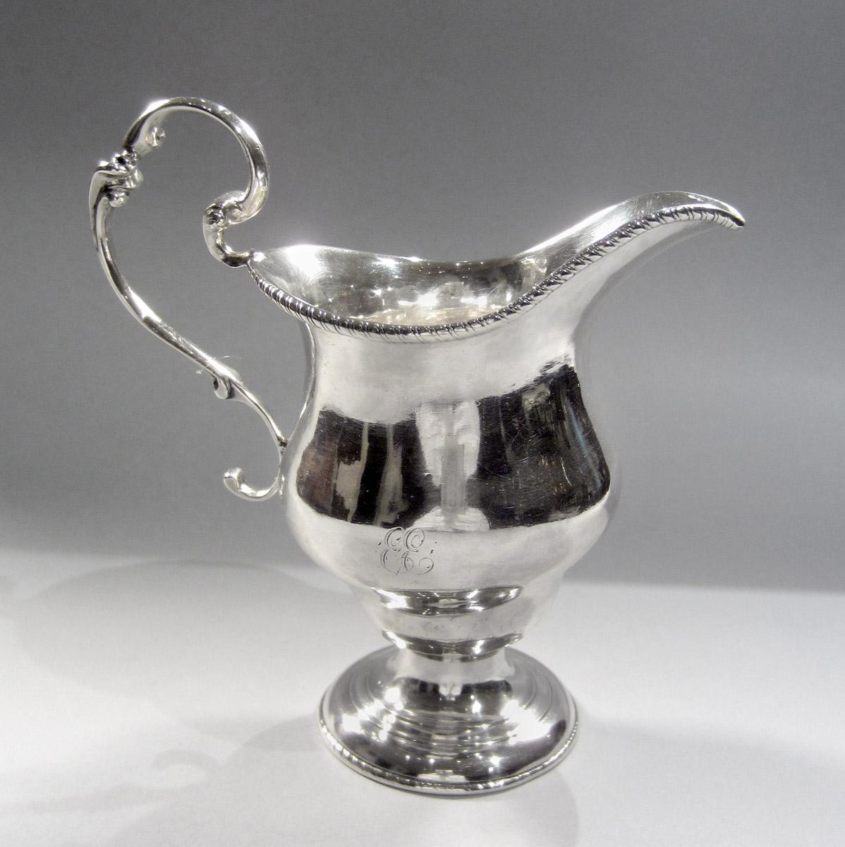 1959.2304 Cream pot, side 2
