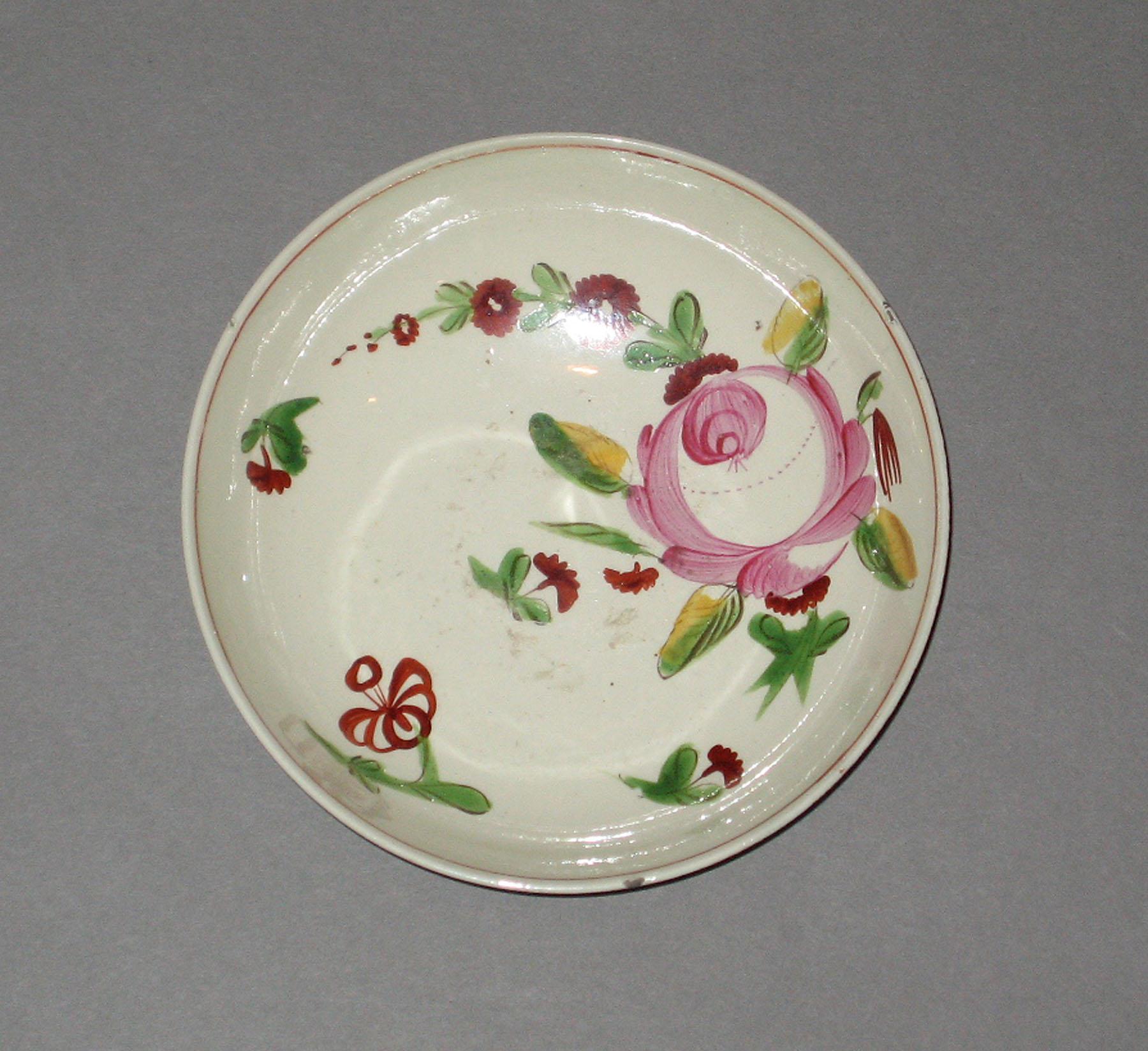 1959.2484 Creamware saucer
